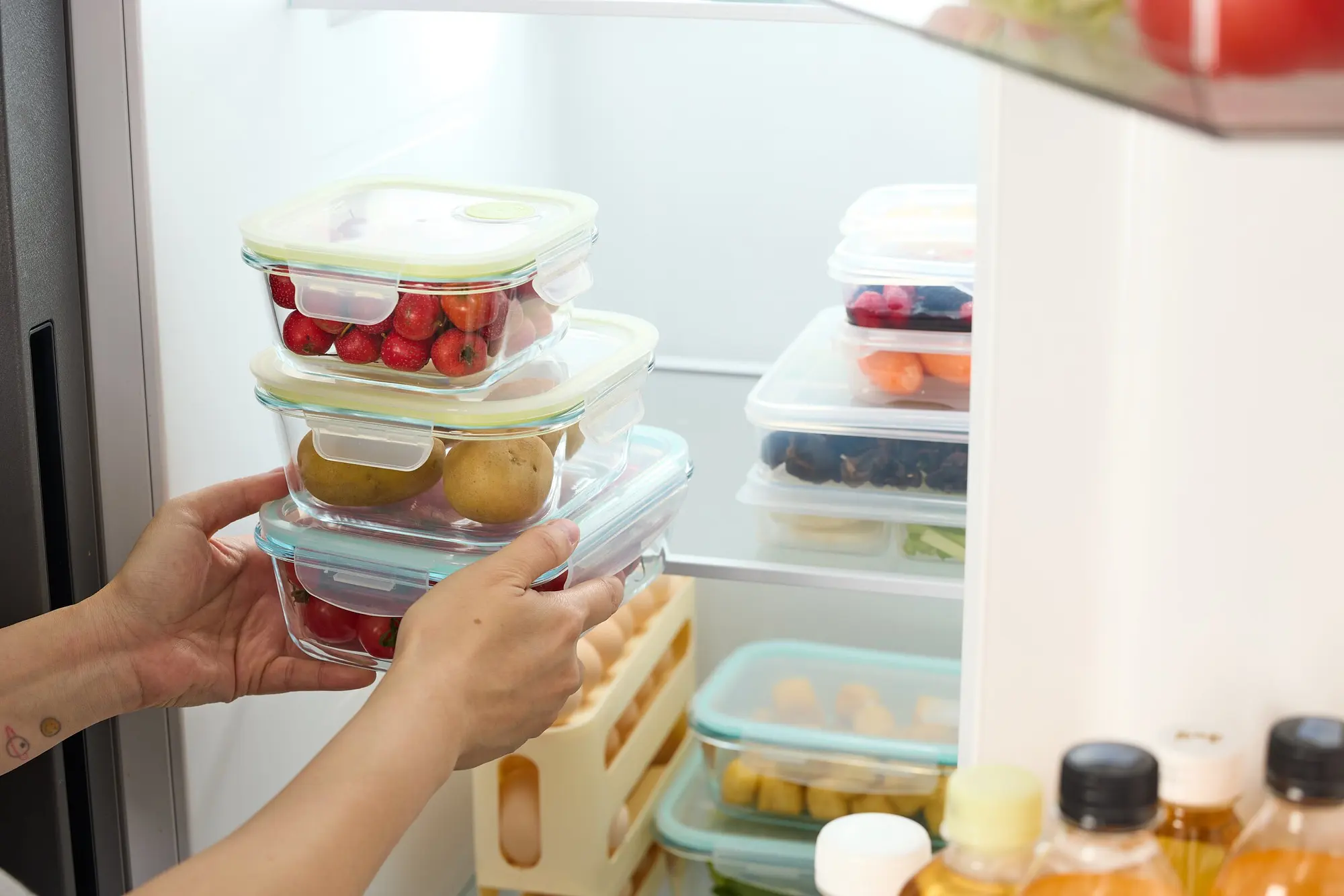 Detail — a stocked fridge or folded laundry