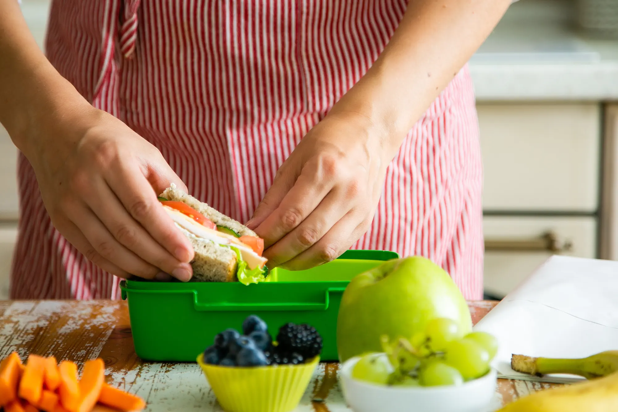 Detail — lunchboxes lined up and ready